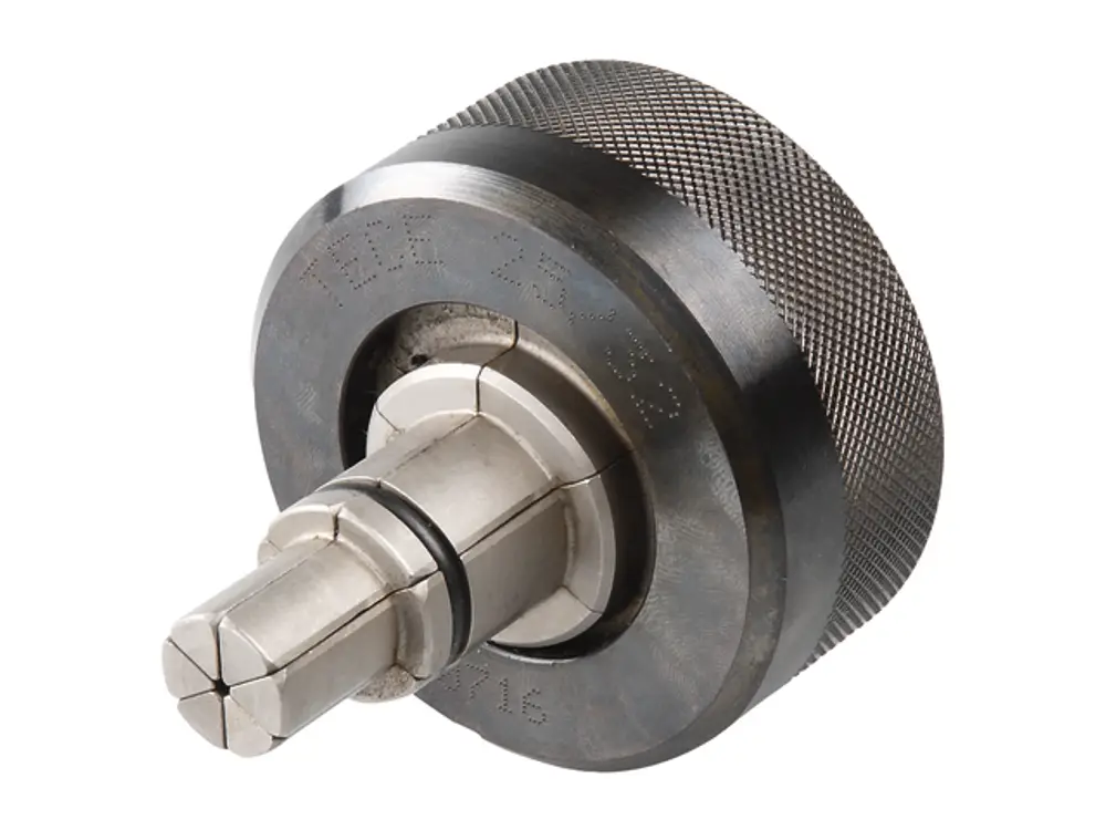 TECEflex Aufweitkopf mit runder Form und geriffelter Oberfläche, geeignet für das Aufweiten von Rohren, in metallischer Ausführung.